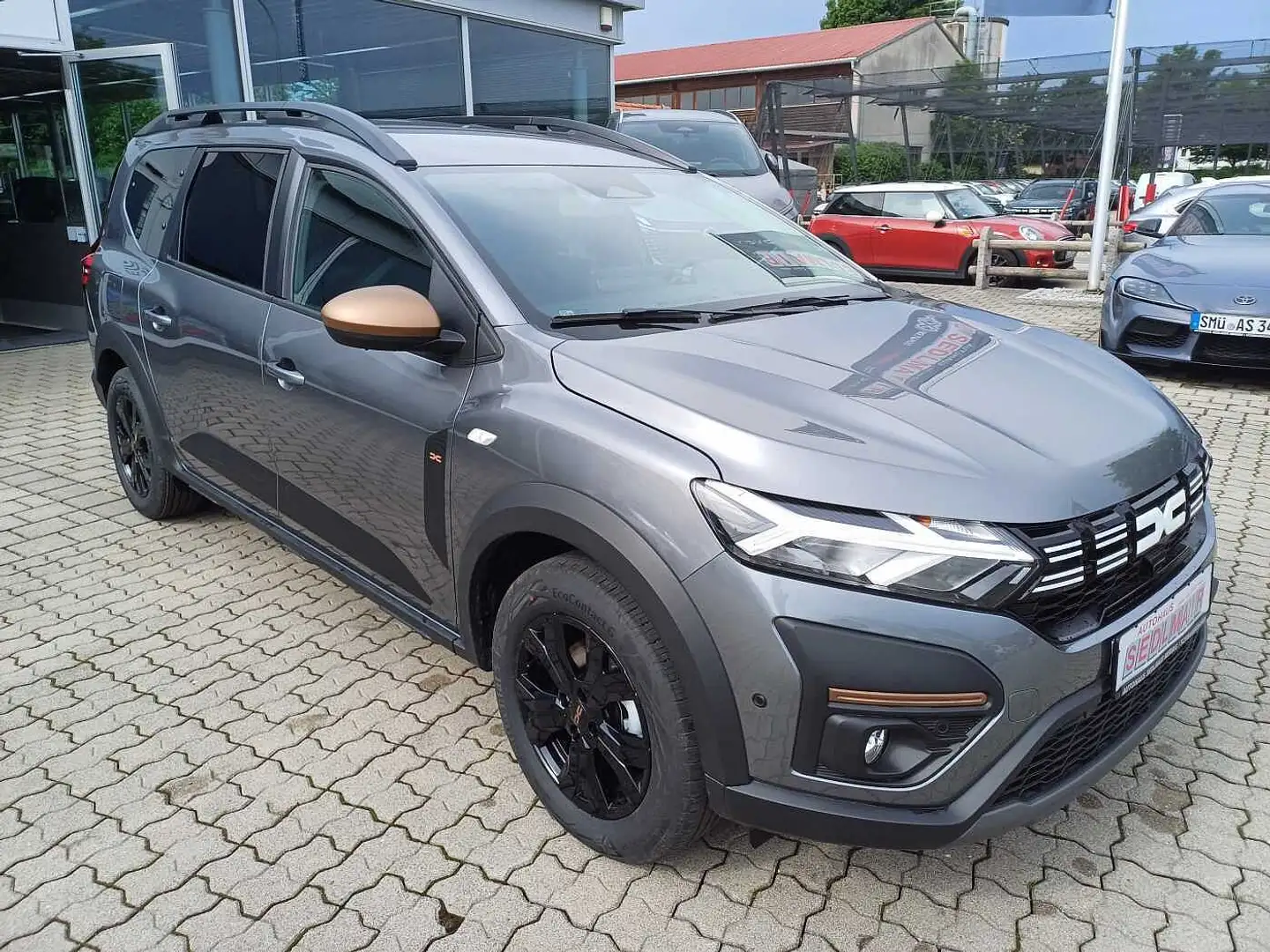 Dacia Jogger HYBRID 140 Extreme+ 7-Sitzer NAV/SHZ/KAM Grijs - 2