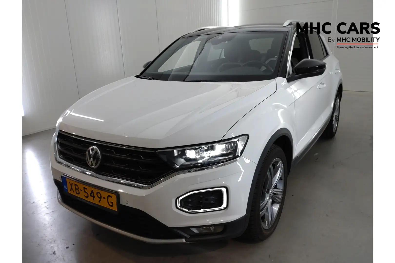 Volkswagen T-Roc 1.0 TSI Sport | Verwacht | Sport stoelen | Digitaa Wit - 1