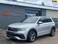 Volkswagen Tiguan 1.5 TSI 150PK AUT R-Line pano NIEUWSTAAT Grijs - thumbnail 1