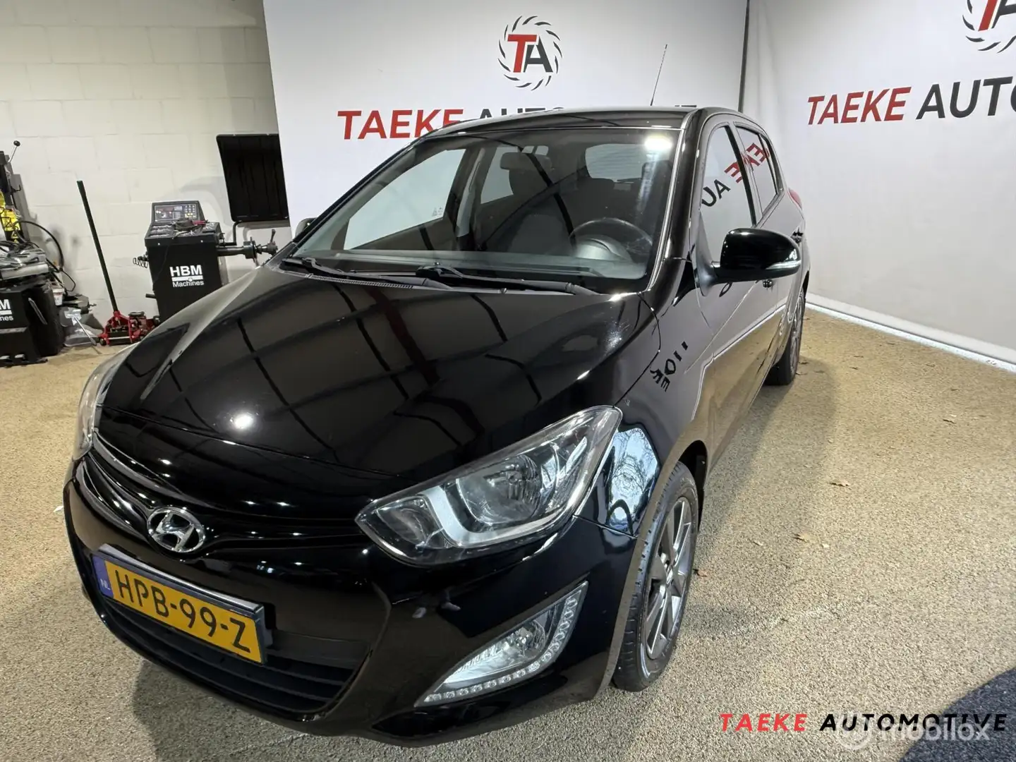 Hyundai i20 1.4i i-Motion Airco/Cruise/Apk Schwarz - 1