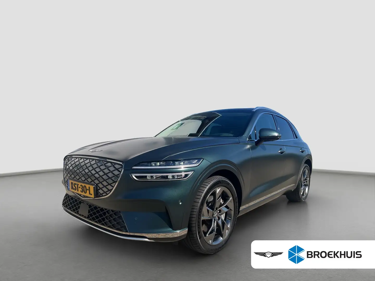Genesis GV70 77kWh 490pk AWD Sport | SOH 100% | Stoelverwarming Grün - 1