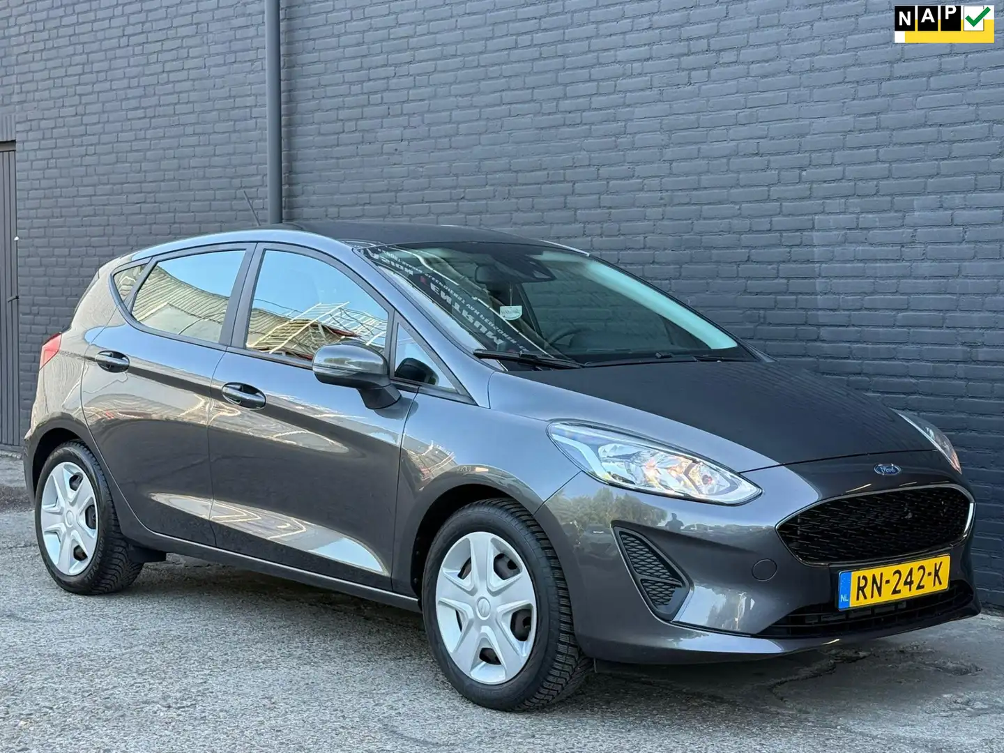 Ford Fiesta 1.1 Trend NAVI | PDC | CARPLAY | AIRCO | NWE APK Gris - 1