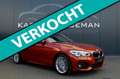 BMW 118 1-serie 118i Edition Sport Line Shadow High Execut Oranje - thumbnail 1