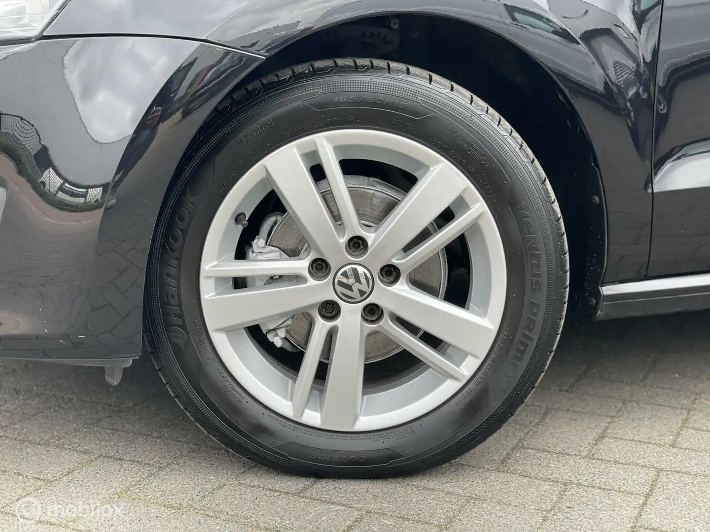 Volkswagen Polo 1.2 Highline 2e Eig Airco Cruise PDC Zwart - 2
