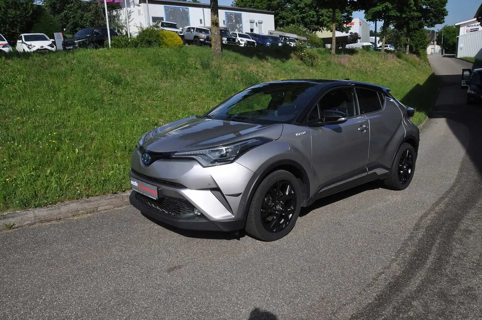 Toyota C-HR Hybrid Style Selection *JBL*, *Navi* Grijs - 1