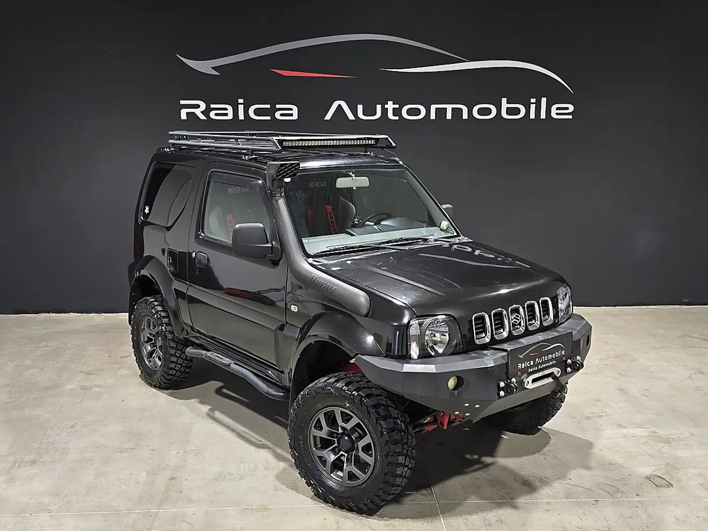 Suzuki Jimny VX X-SCHOCK DAKAR Umbau Schwarz - 1