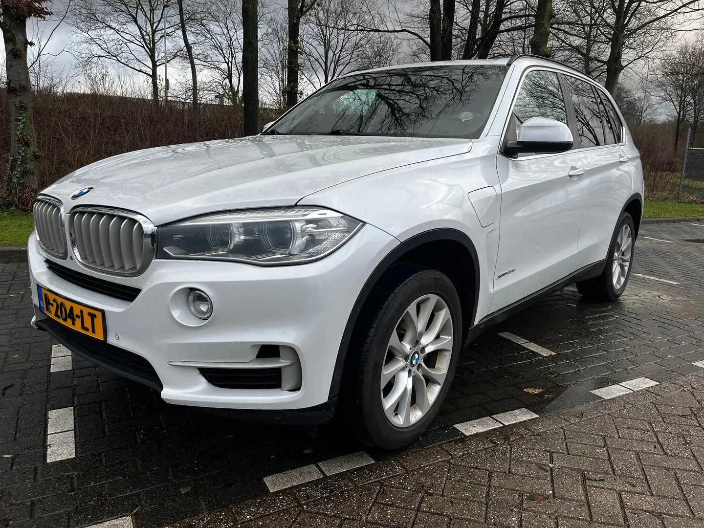 BMW X5 xDrive40e iPerf. parelmoer, HUD, pano,etc Wit - 1