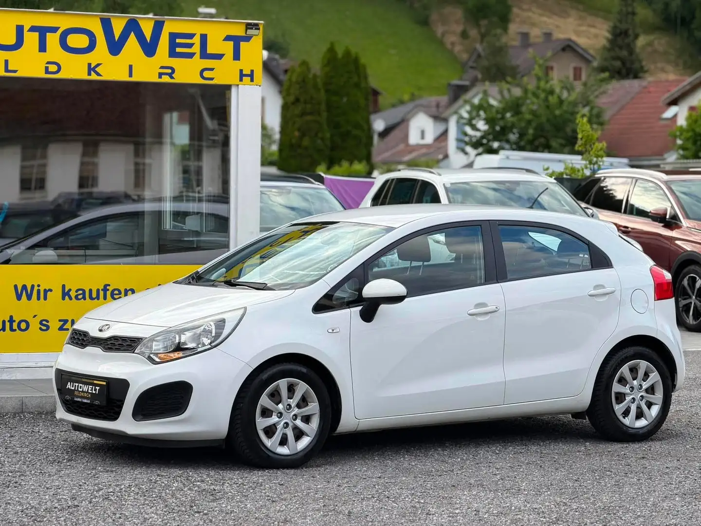 Kia Rio Attract 1,2 BENZIN *NEU PICKERL 07/2027 *KREDIT** Weiß - 1