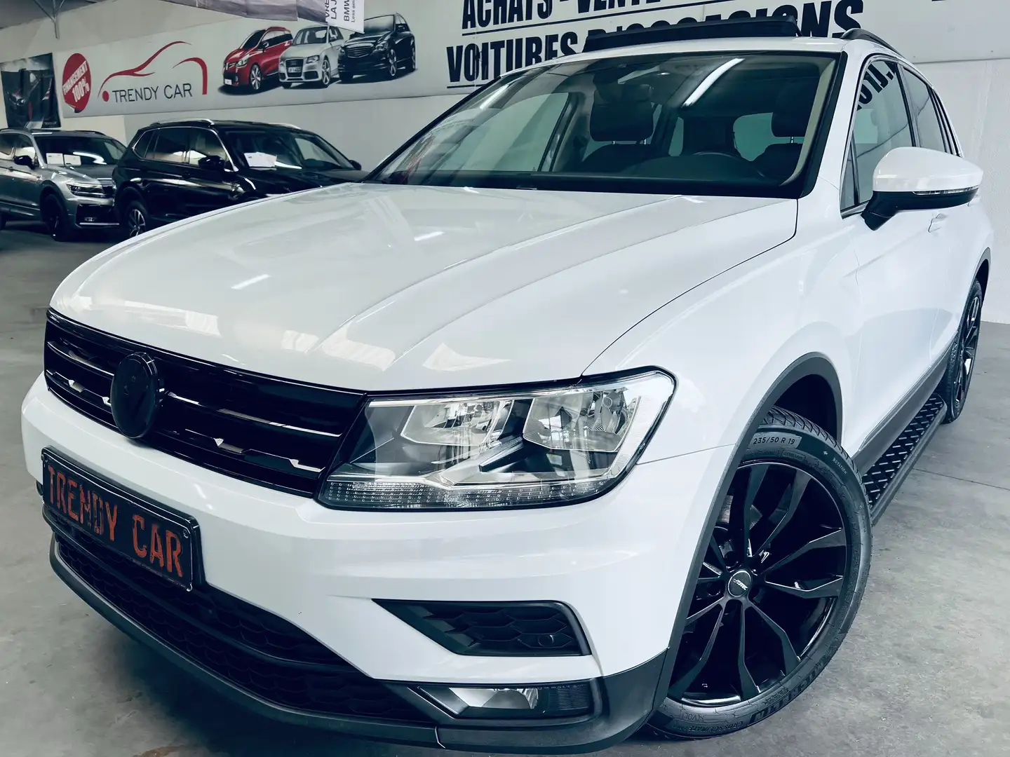 Volkswagen Tiguan 1.4 TSI Comfortline+NAVI+PANO+ACC+CARNET+GARANTIE Wit - 1