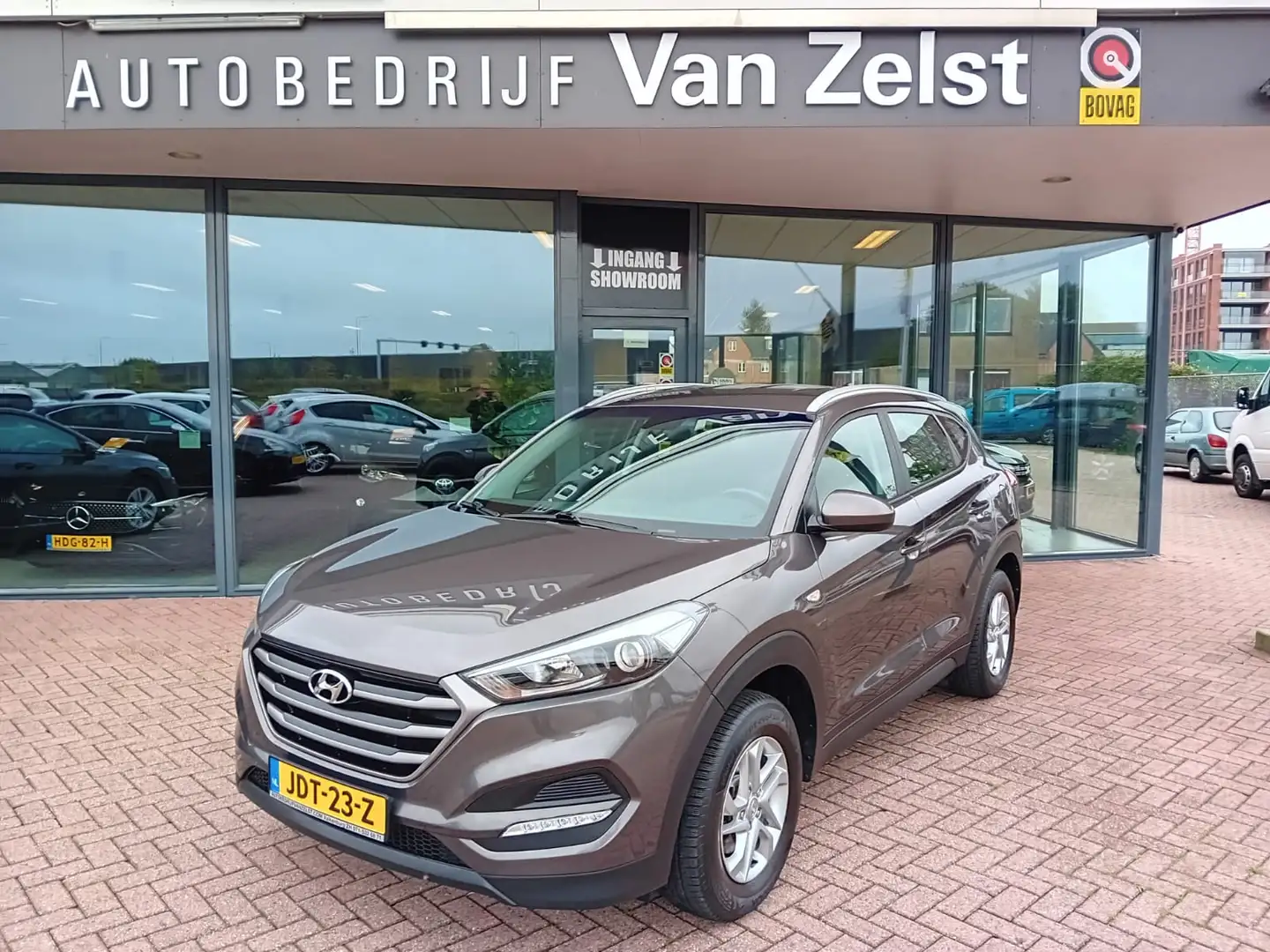 Hyundai TUCSON 1.6 GDi Comfort, Airco, Carplay/Android auto, Crui Bruin - 1