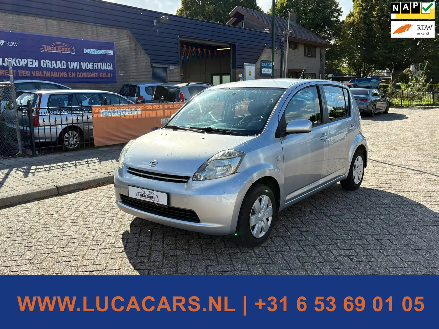 Daihatsu Sirion 2 1.0-12V Premium NIEUWE APK! Grau - 1