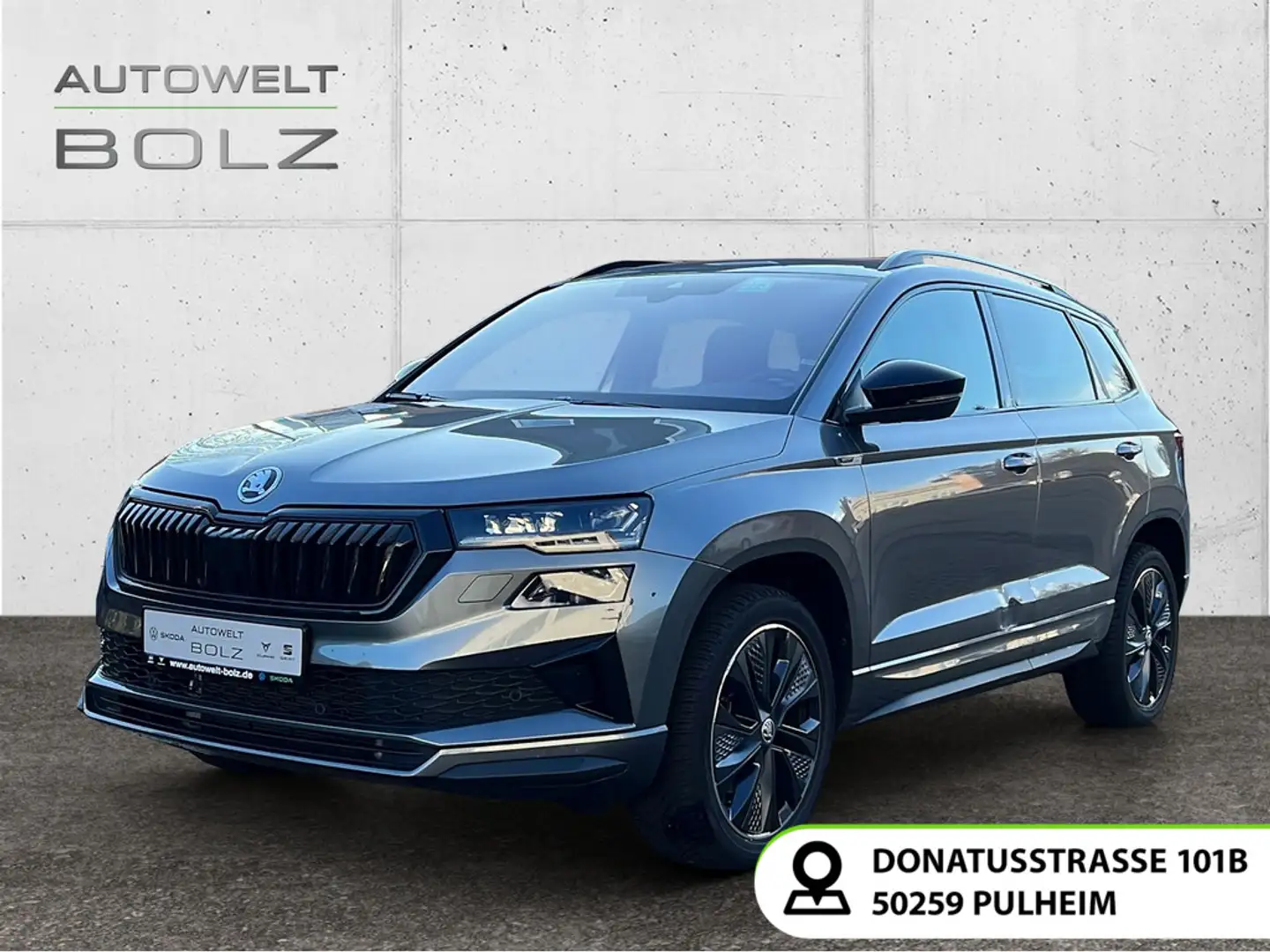 Skoda Karoq Sportline 1.5 TSI Pano Kamera Navi Leder M Grau - 1