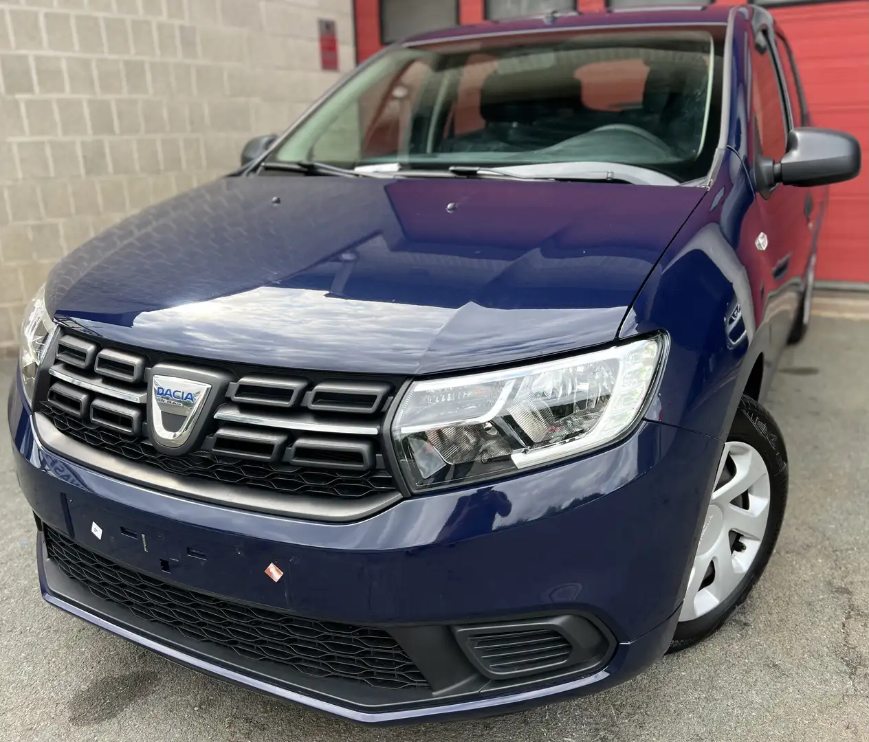 Dacia Sandero 1.0i SCe Comfort + CAR-PASS Blauw - 1