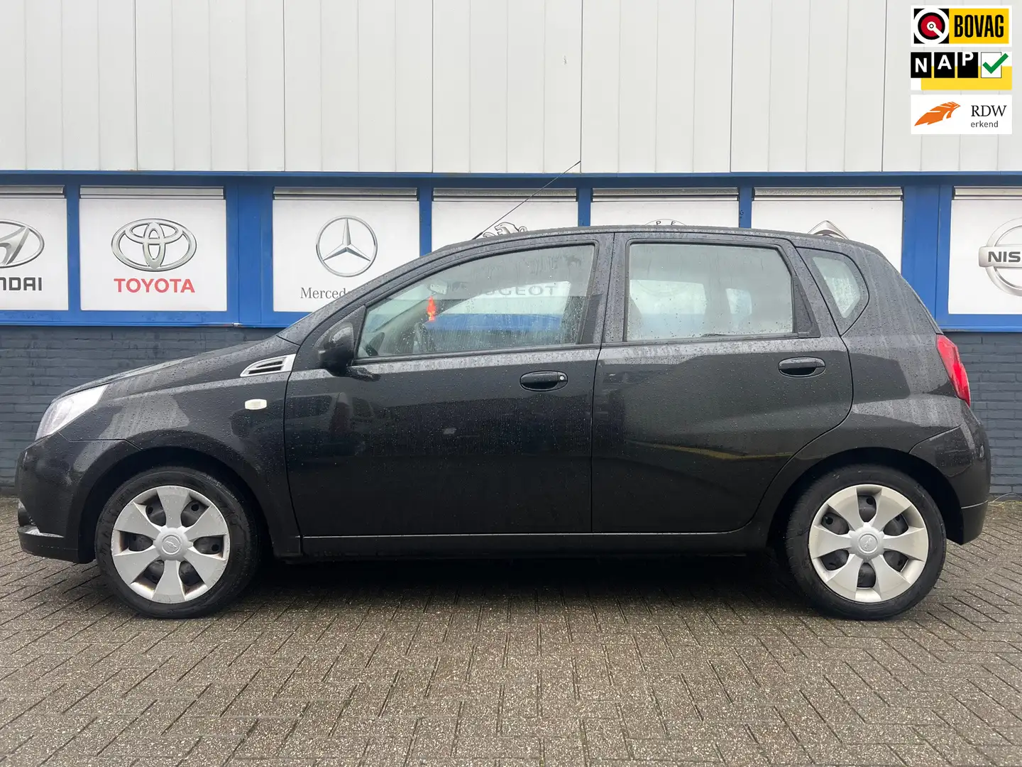 Chevrolet Aveo 1.2 16V LS B-clever 2010 NWE.APK 2495 EU Zwart - 1