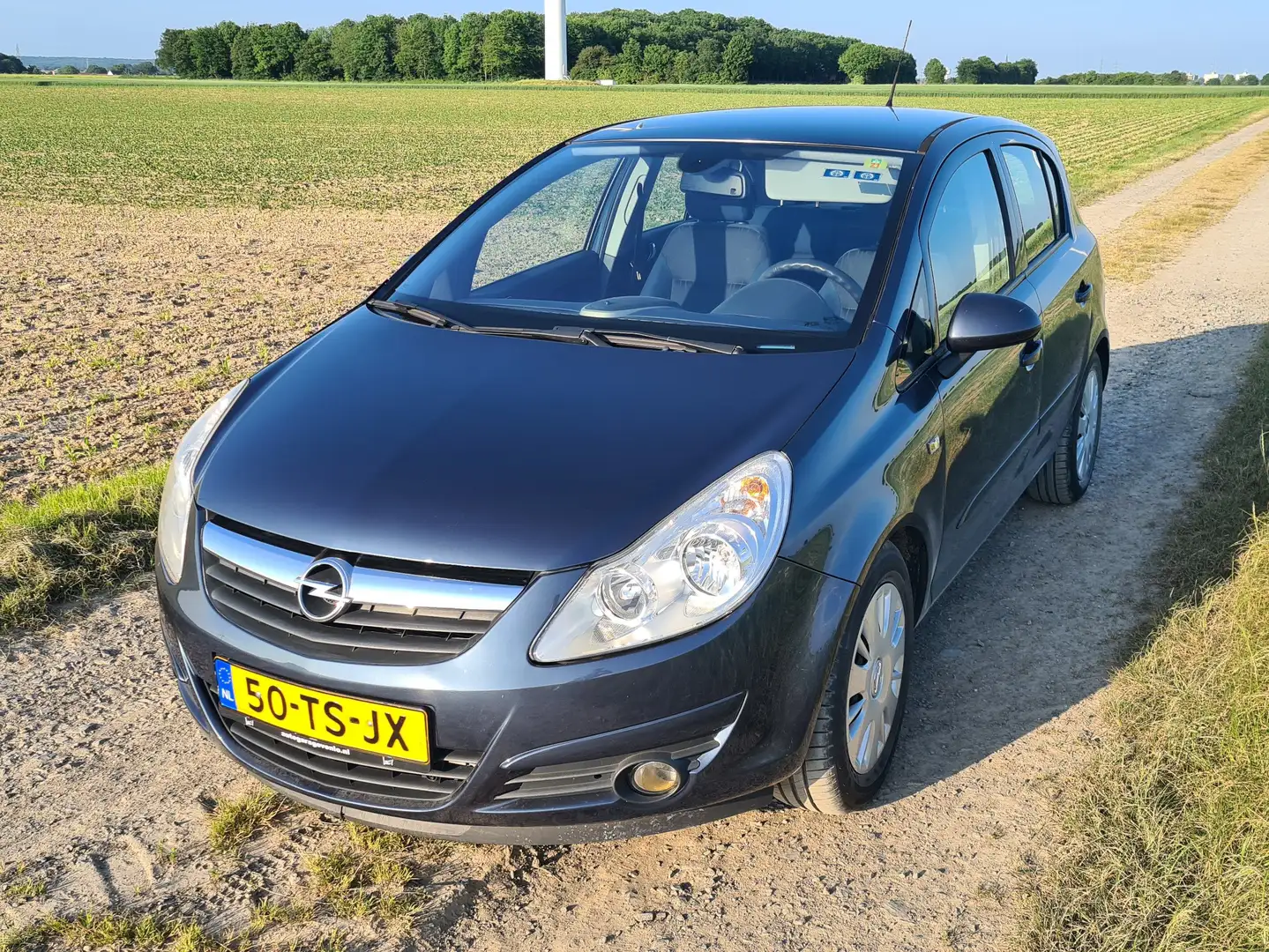 Opel Corsa 1.2-16V Enjoy, Airco, Cruisecontrol, APK jan-2025 Blauw - 1