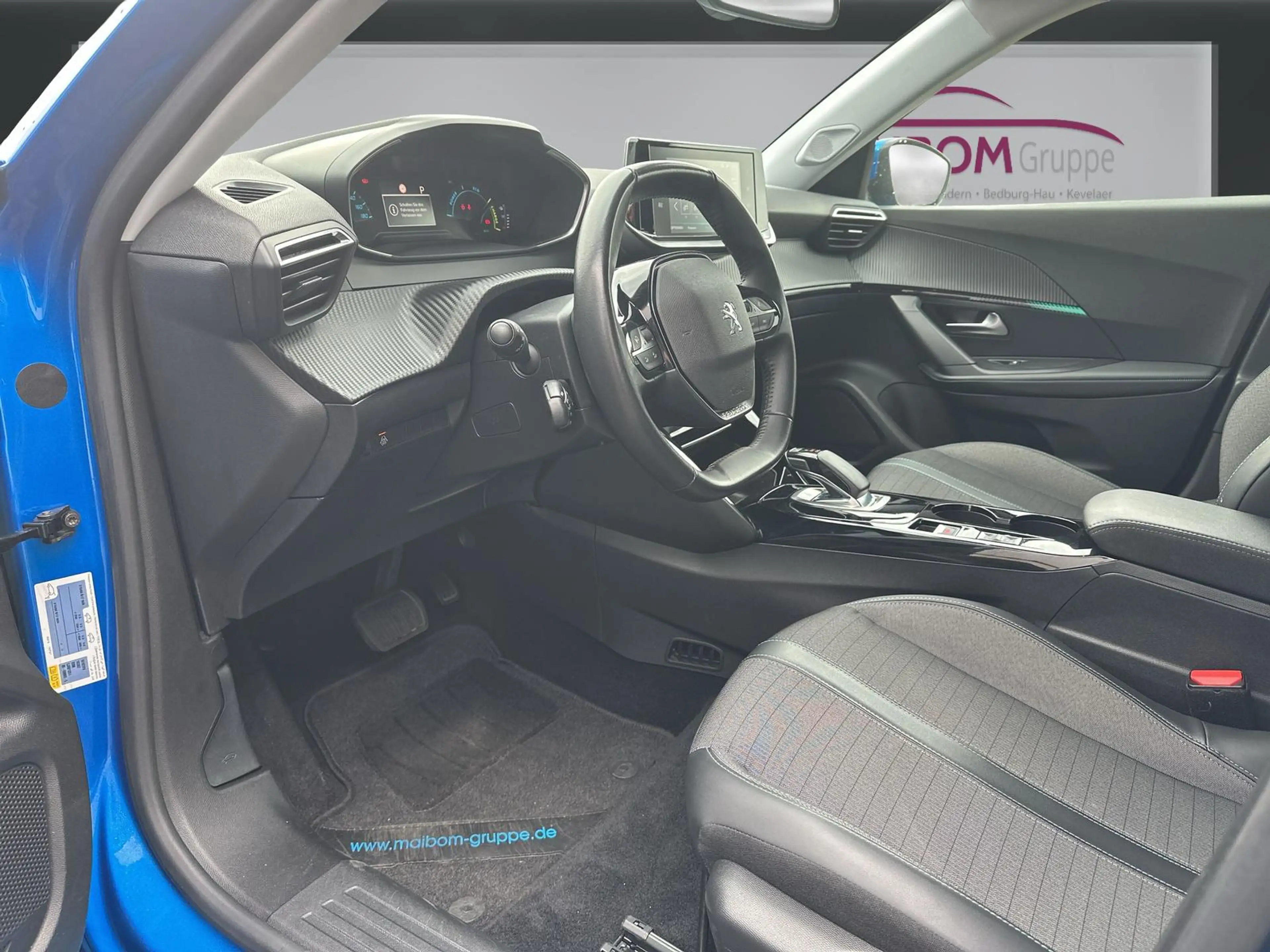 Peugeot e-2008 Allure — photo 11