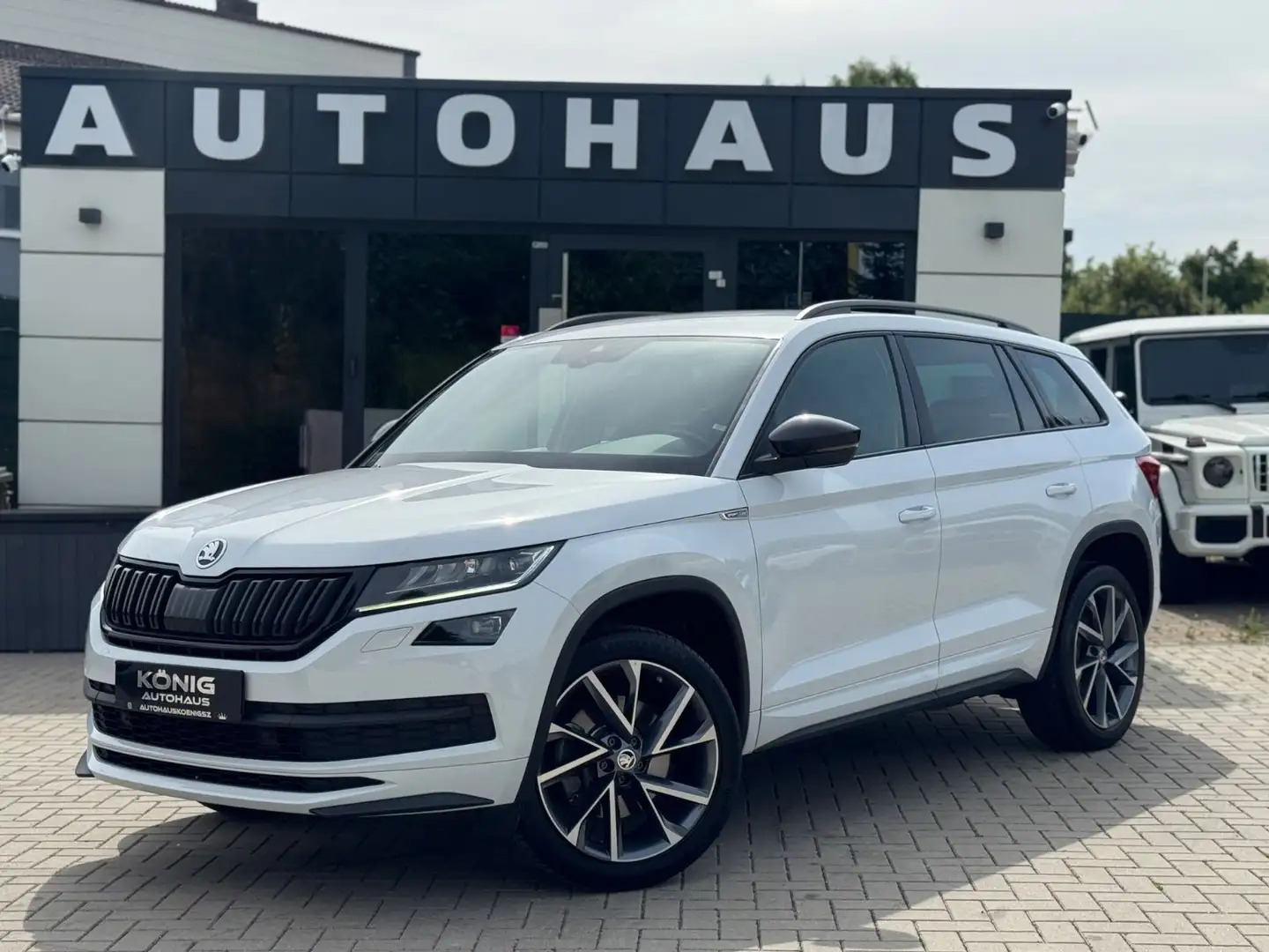Skoda Kodiaq Sportline 4x4*R-Kam*AHK*Canton*Kessy Weiß - 1