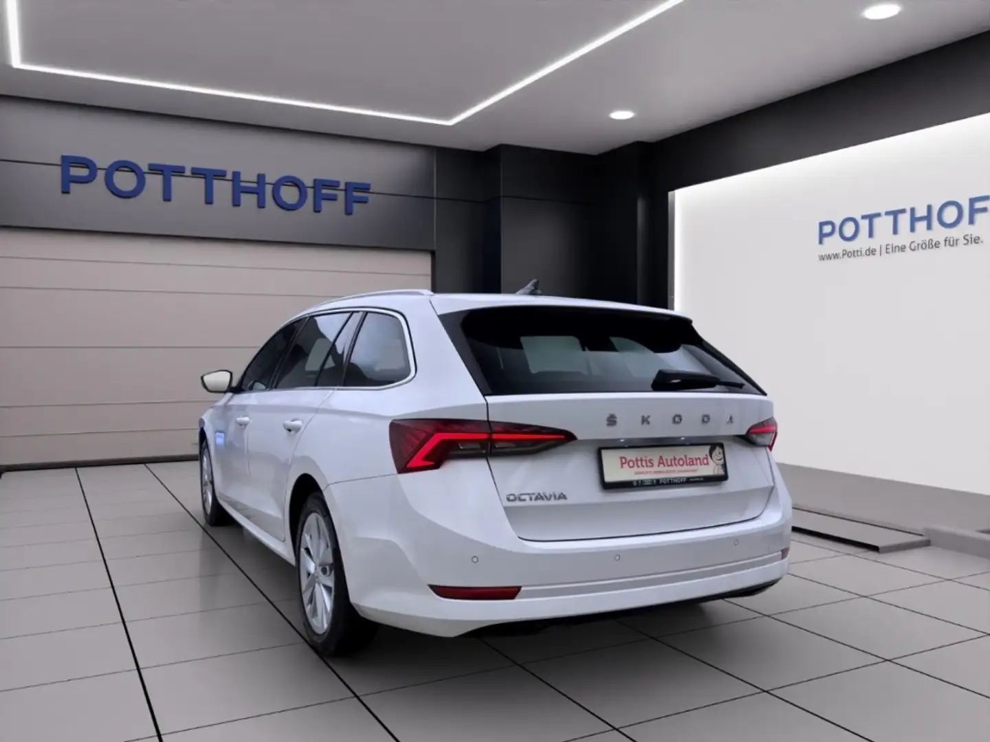 Skoda Octavia Combi 2.0 TDI DSG STYLE NAVI AHK PDC SITZHZG Weiß - 2