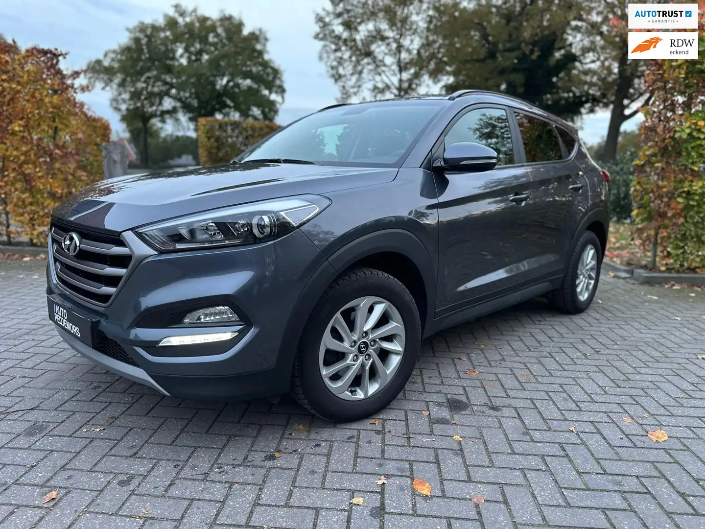 Hyundai TUCSON 1.6 T-GDi Comfort | Pano| Camera| DAB| Carplay Gris - 1