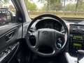 Hyundai TUCSON 2.7i V6 4WD Style/Aut/Climate/Cruise/Pdc/Leer/Open Grau - thumbnail 16