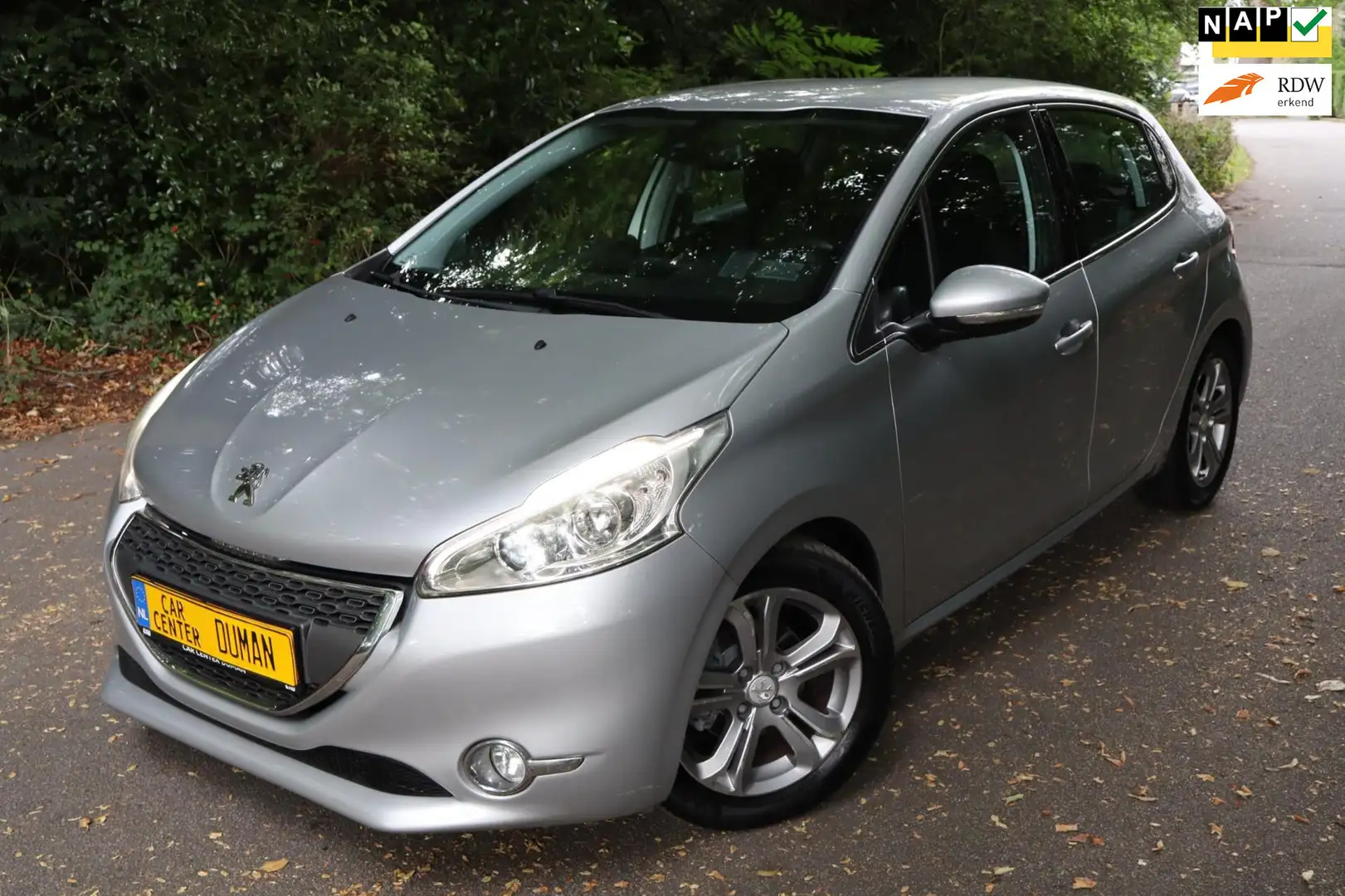 Peugeot 208 1.4 VTi Allure NAP CLIMA CRUISE Grau - 1