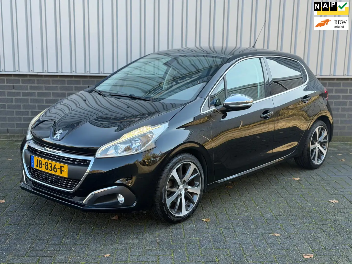 Peugeot 208 1.2 PureTech Première |Navi|Pano|CruiseCtrl|Camera Zwart - 1