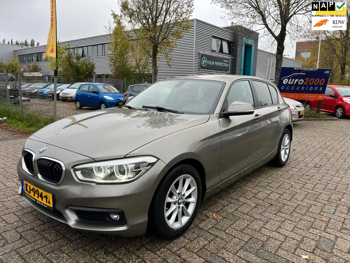BMW 118 1-serie 118i Centennial High Executive - NAVIGATIE Grau - 1