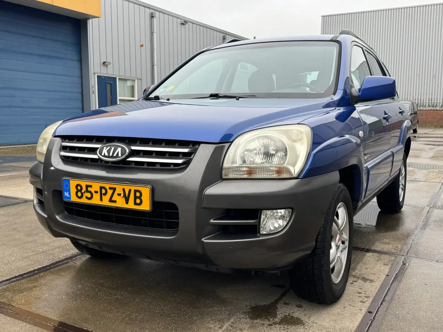 Kia Sportage 2.7 V6 Adventure 4WD Blauw - 1