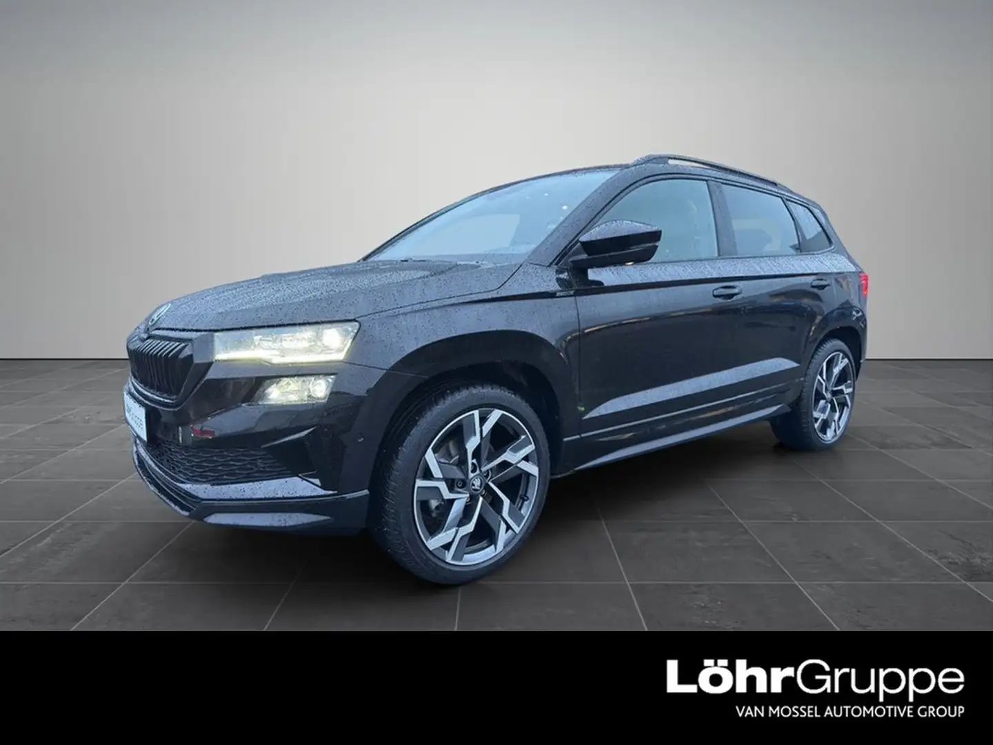 Skoda Karoq 2.0 TSI Sportline 4x4 *PANO*STNDHZNG*AHK*MATRIX... Schwarz - 1