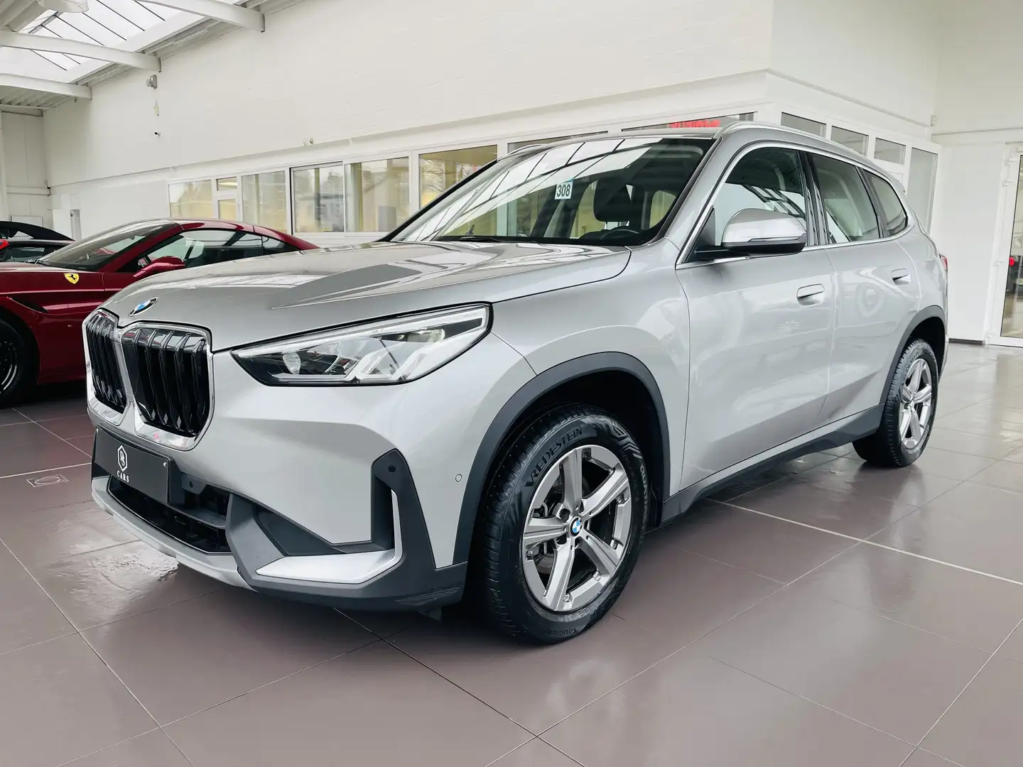 BMW X1 1.5iA MHEV *** GARANTIE + LED + GPS + NEW MODELE** Gris - 1