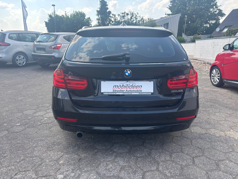 BMW 318 318d Touring — photo 7