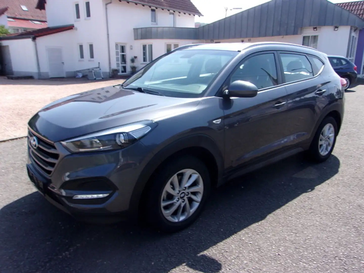 Hyundai TUCSON Tucson Passion Klimaaut Navi SHZ ALU Kamera Grau - 1