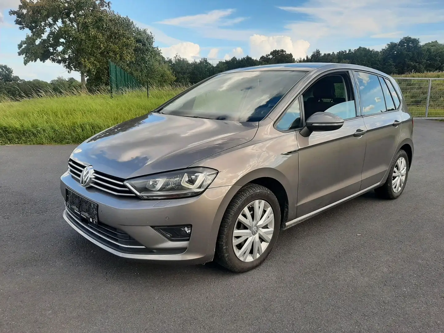 Volkswagen Golf Sportsvan 1.6 TDI LOUNGE,Bi-Xenon,1.Hand Grijs - 1