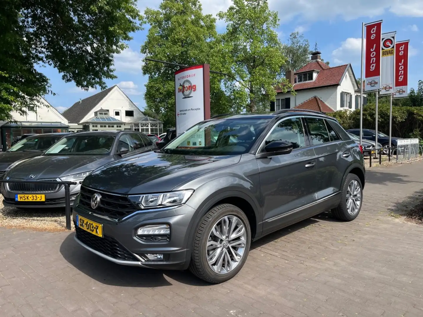 Volkswagen T-Roc 1.0 TSI STYLE / NAVI / CARPLAY / ADAP. CRUISE / 18 Grijs - 1