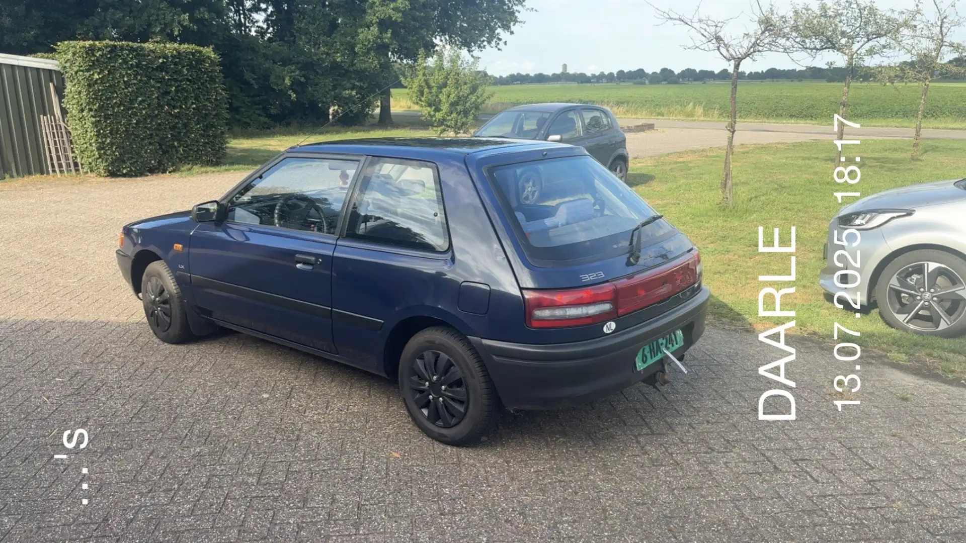 Mazda 323 1.6i LX AUTOMAAT NEW APK 2027 Trekhaak Blauw - 1
