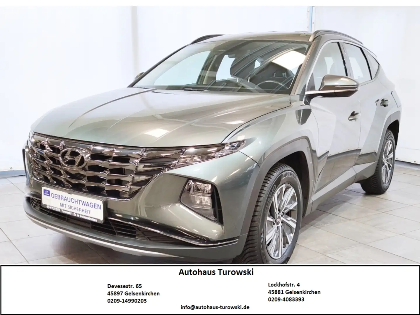 Hyundai TUCSON Select 2WD Navi SHZ PDC Kamera 1.Hand Grau - 1