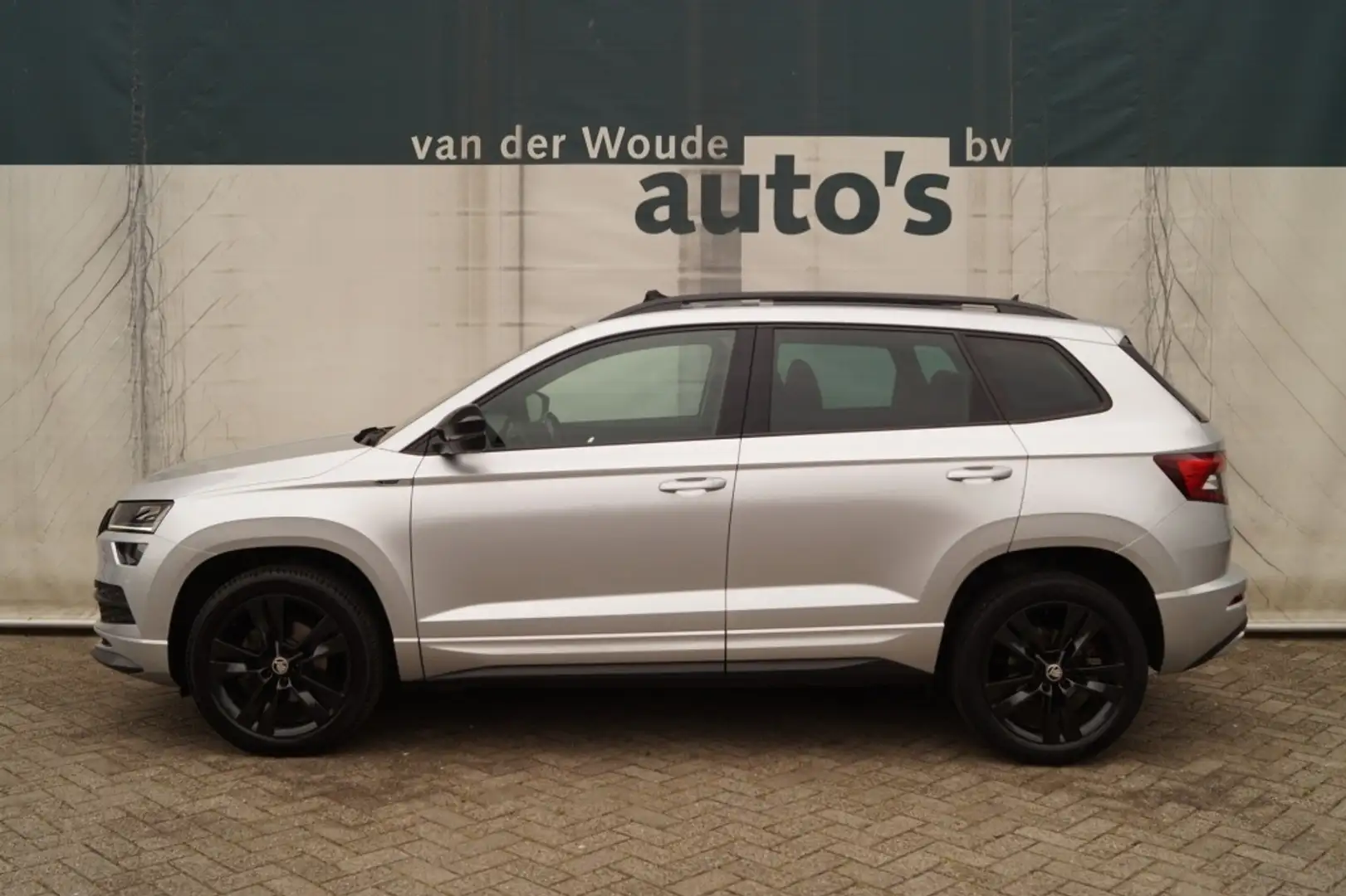 Skoda Karoq 1.5 TSI 150pk DSG Sportline -PANO-LED-ECC-TREKHAAK Grijs - 1