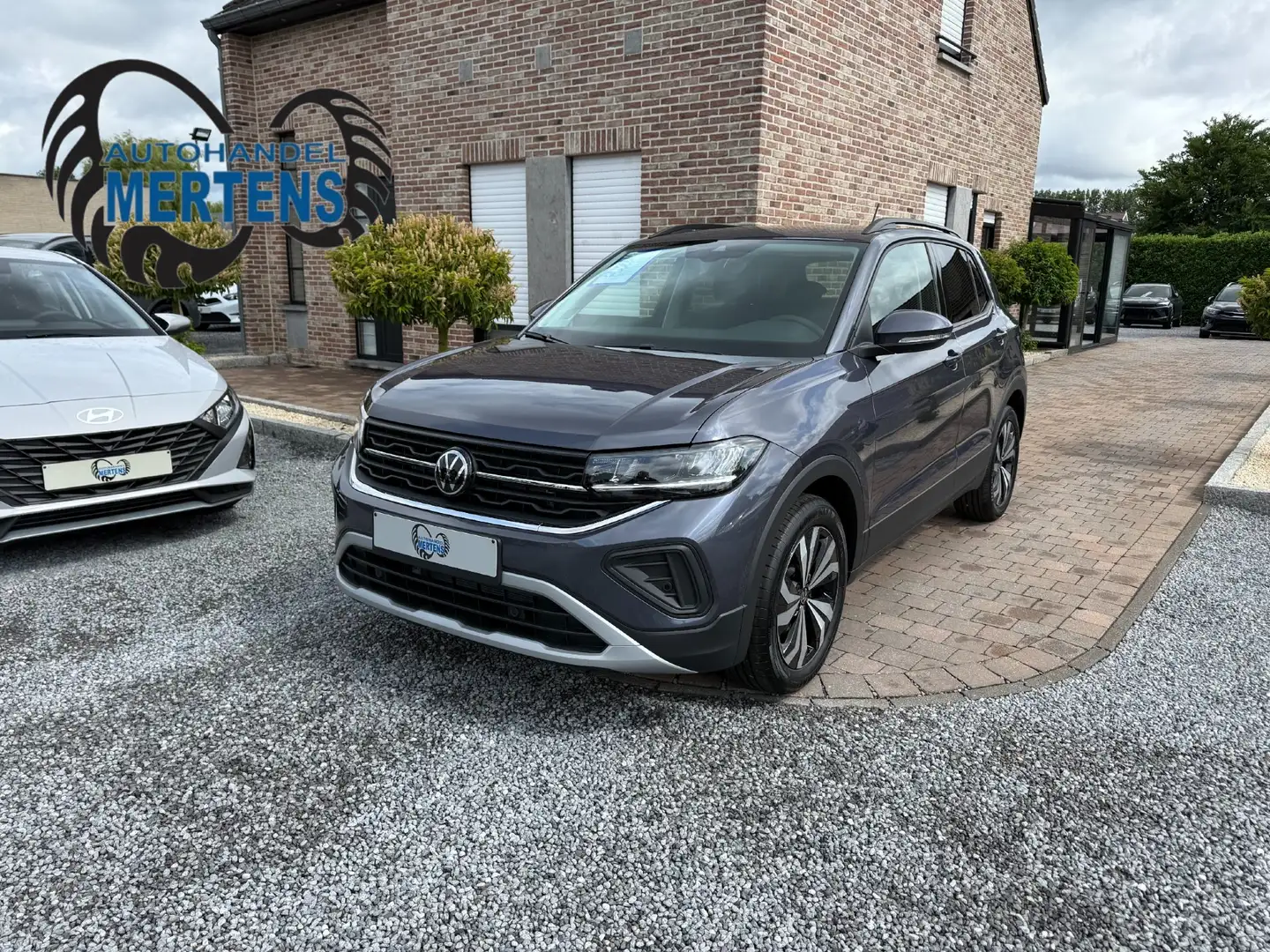Volkswagen T-Cross 1.0 TSI 116PK DSG AR/CAM PDC V+A ACC ALU NIEUW 0KM Grijs - 1