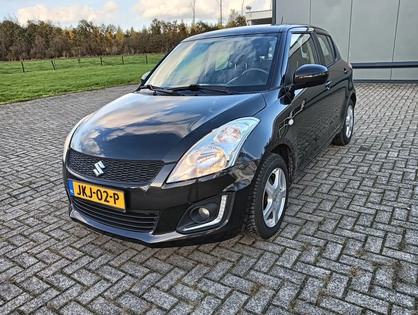 Suzuki Swift 1.2 Comfort EASSS . Airco. Cruise control Zwart - 1