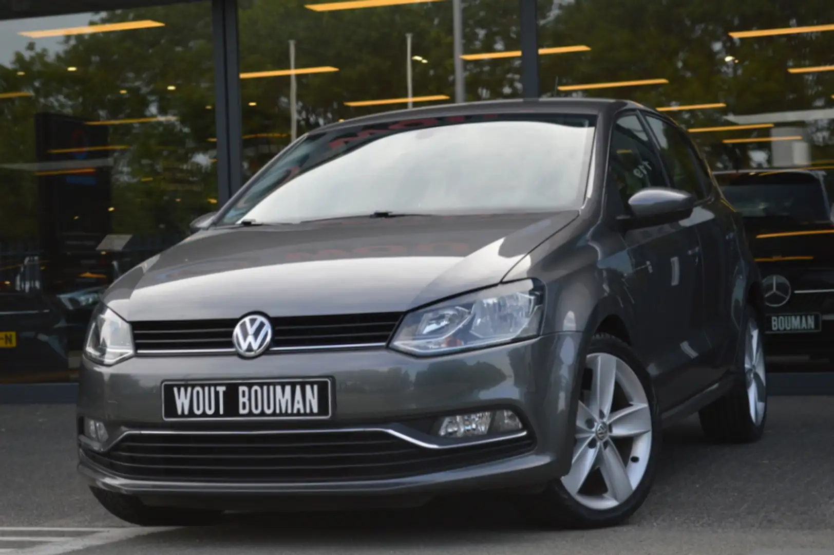 Volkswagen Polo 1.2 TSI Lounge Navi Airco Cruise Pdc Grijs - 1