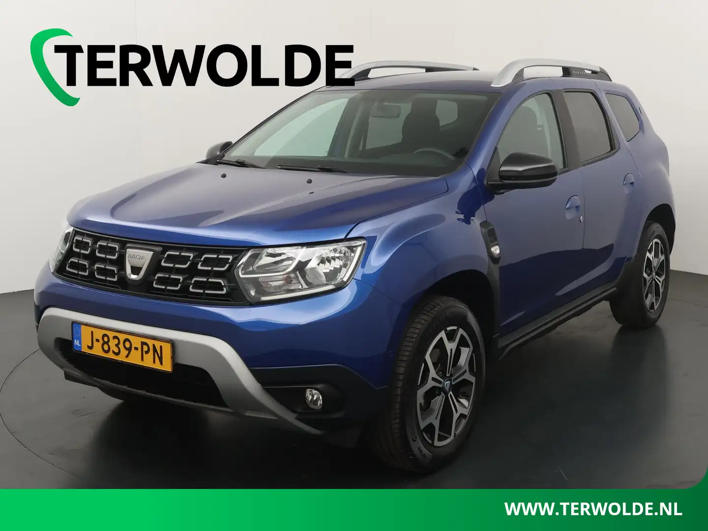 Dacia Duster TCe 100 Bi-Fuel Série Limitée 15th Anniversary | P Bleu - 1