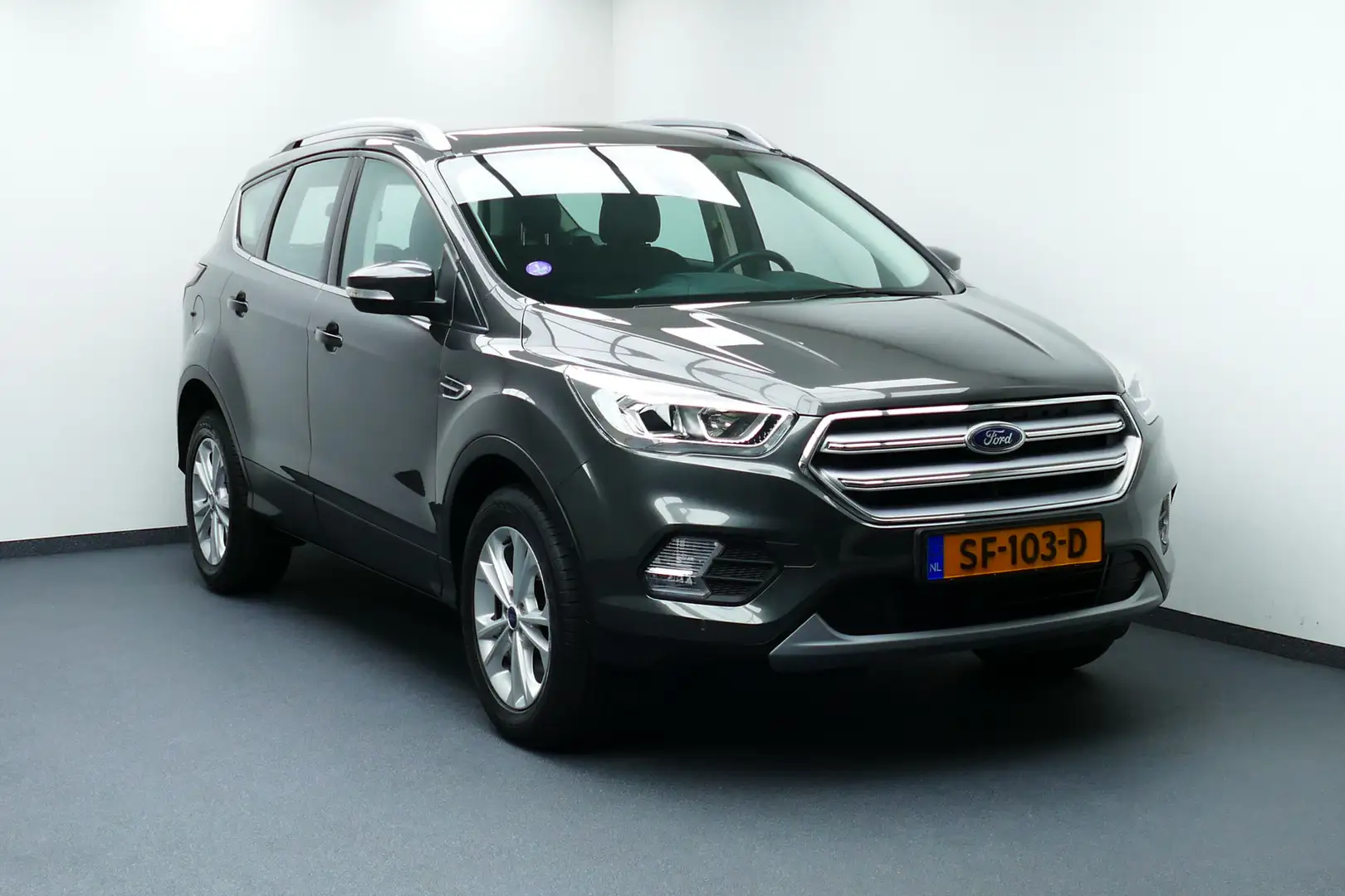 Ford Kuga 1.5 EcoBoost Titanium 1-Eig. Navi, Clima, Cruise, Grijs - 1