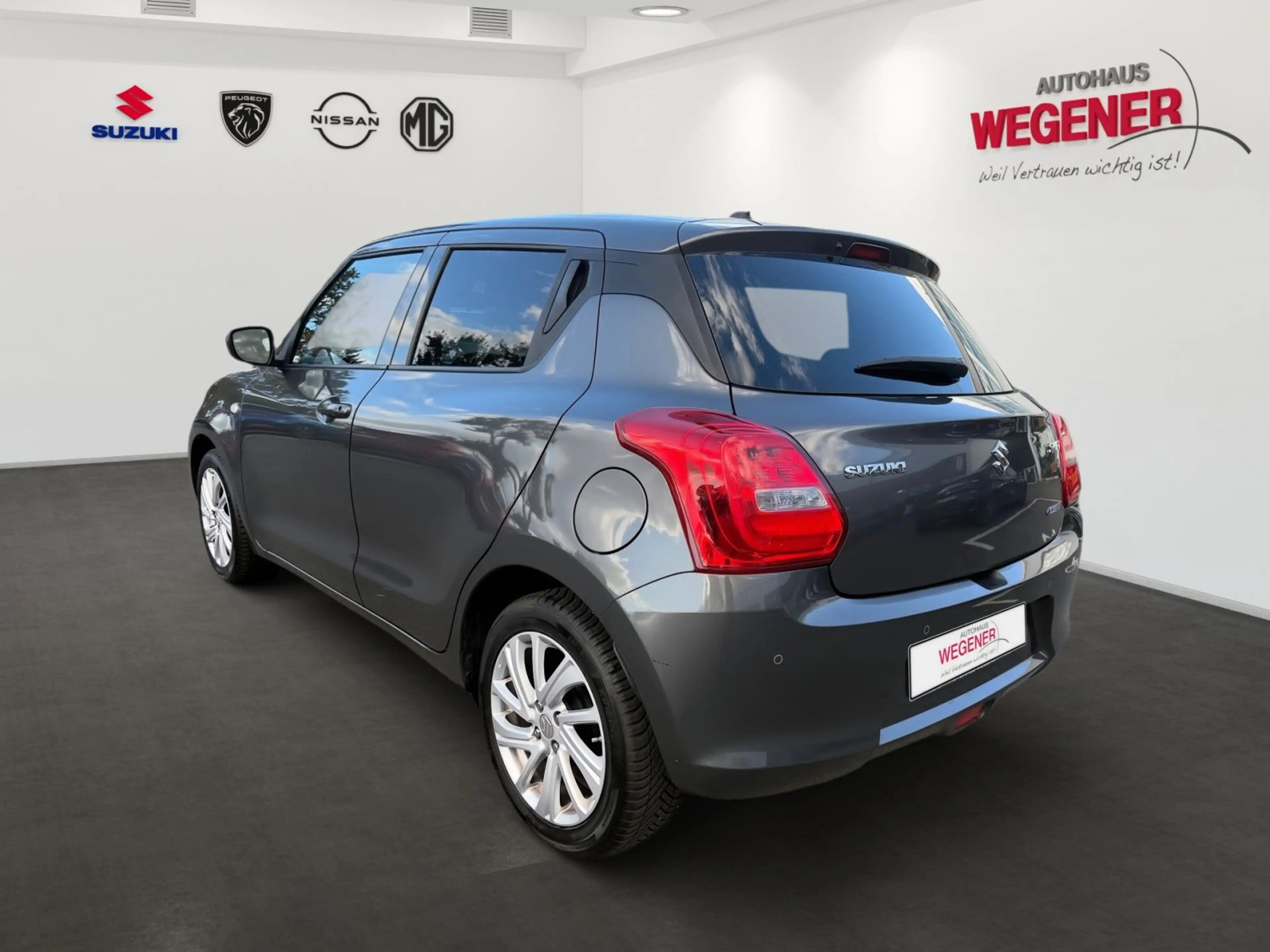Suzuki Swift 1.3 Comfort — photo 4