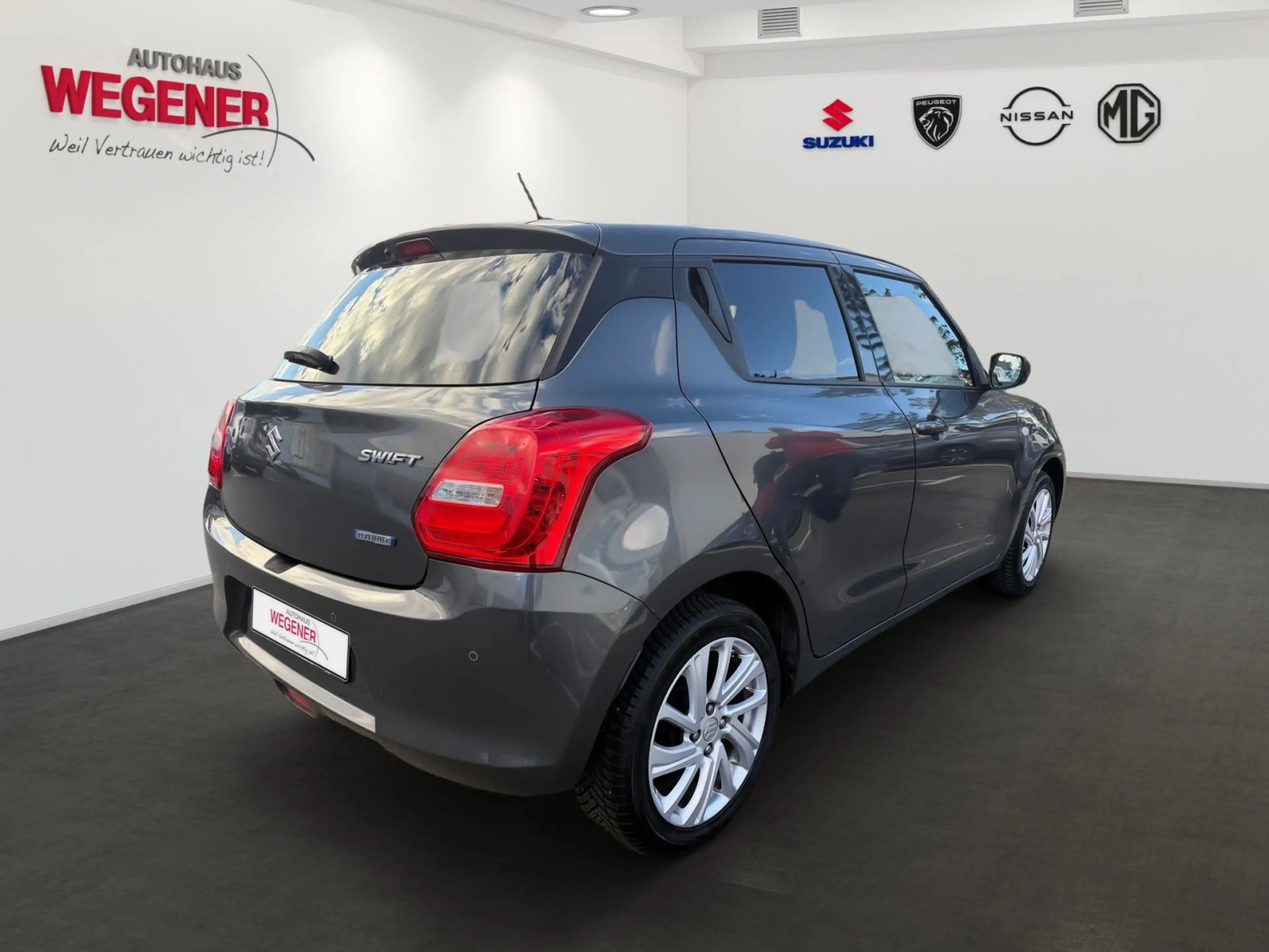 Suzuki Swift 1.3 Comfort — photo 3