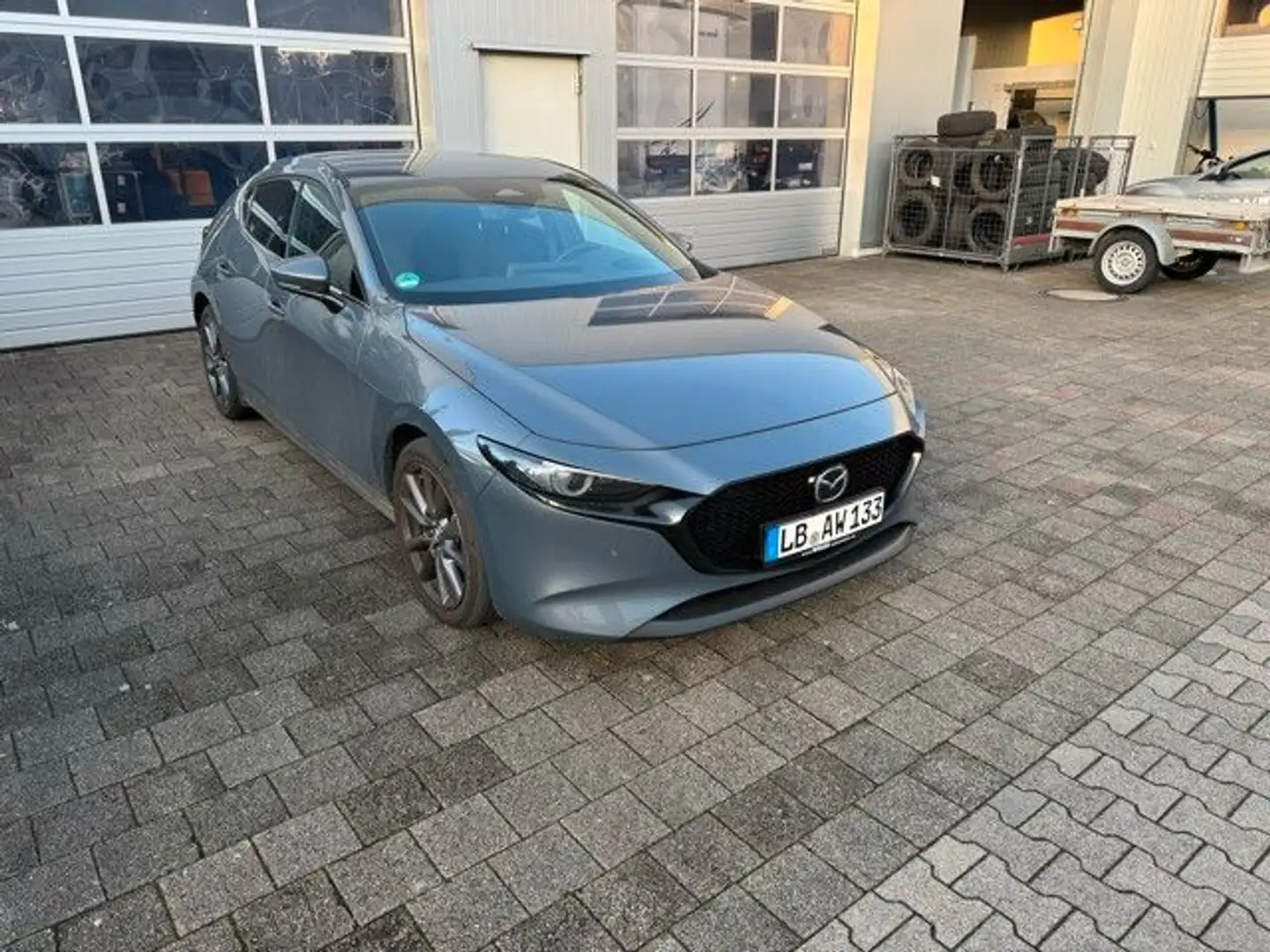 Mazda 3 G-140PS Automatik Exclusive ,Navi Grijs - 1