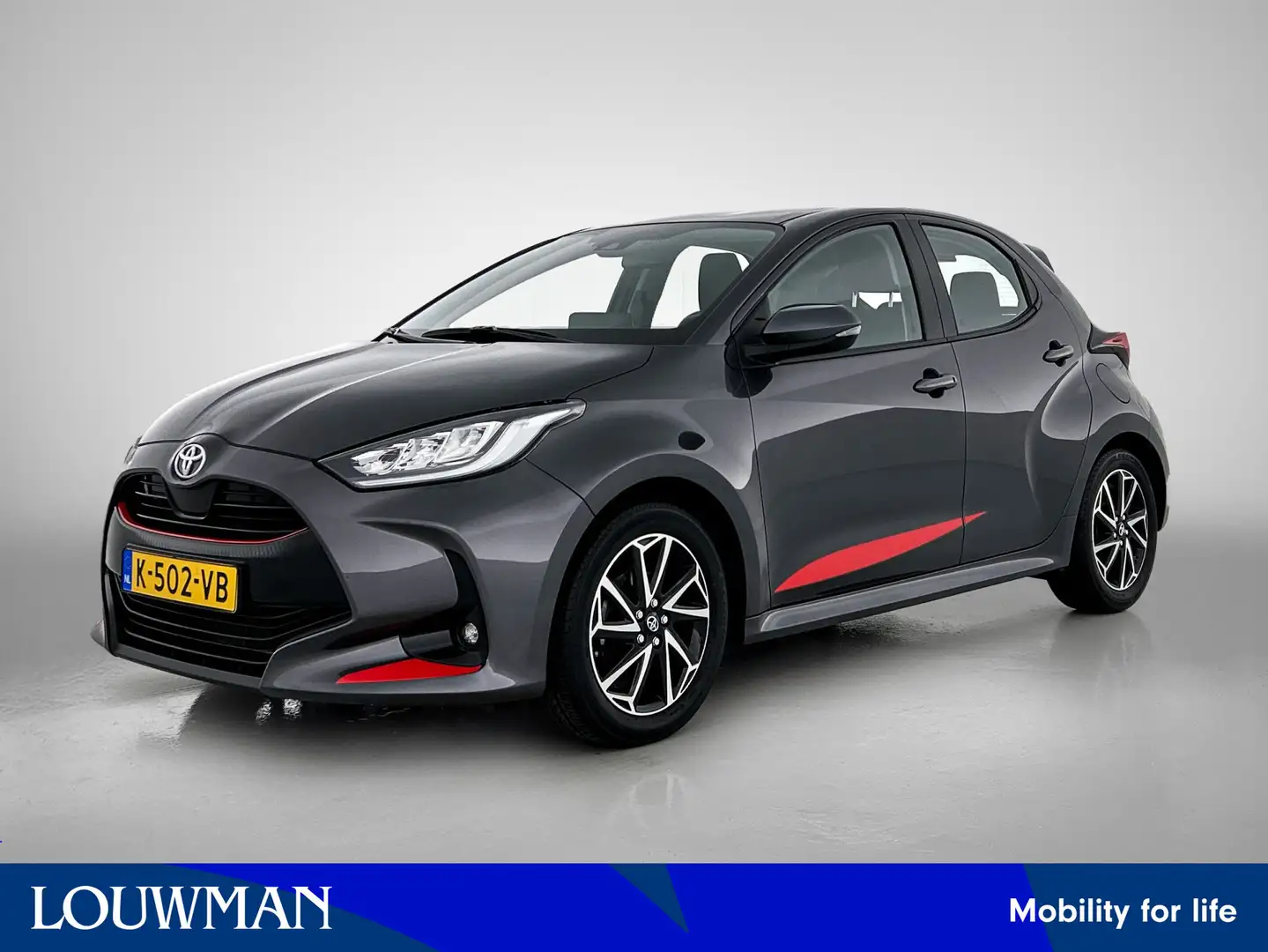 Toyota Yaris 1.5 VVT-i Dynamic | Navigatie | Camera | Keyless E Grijs - 1