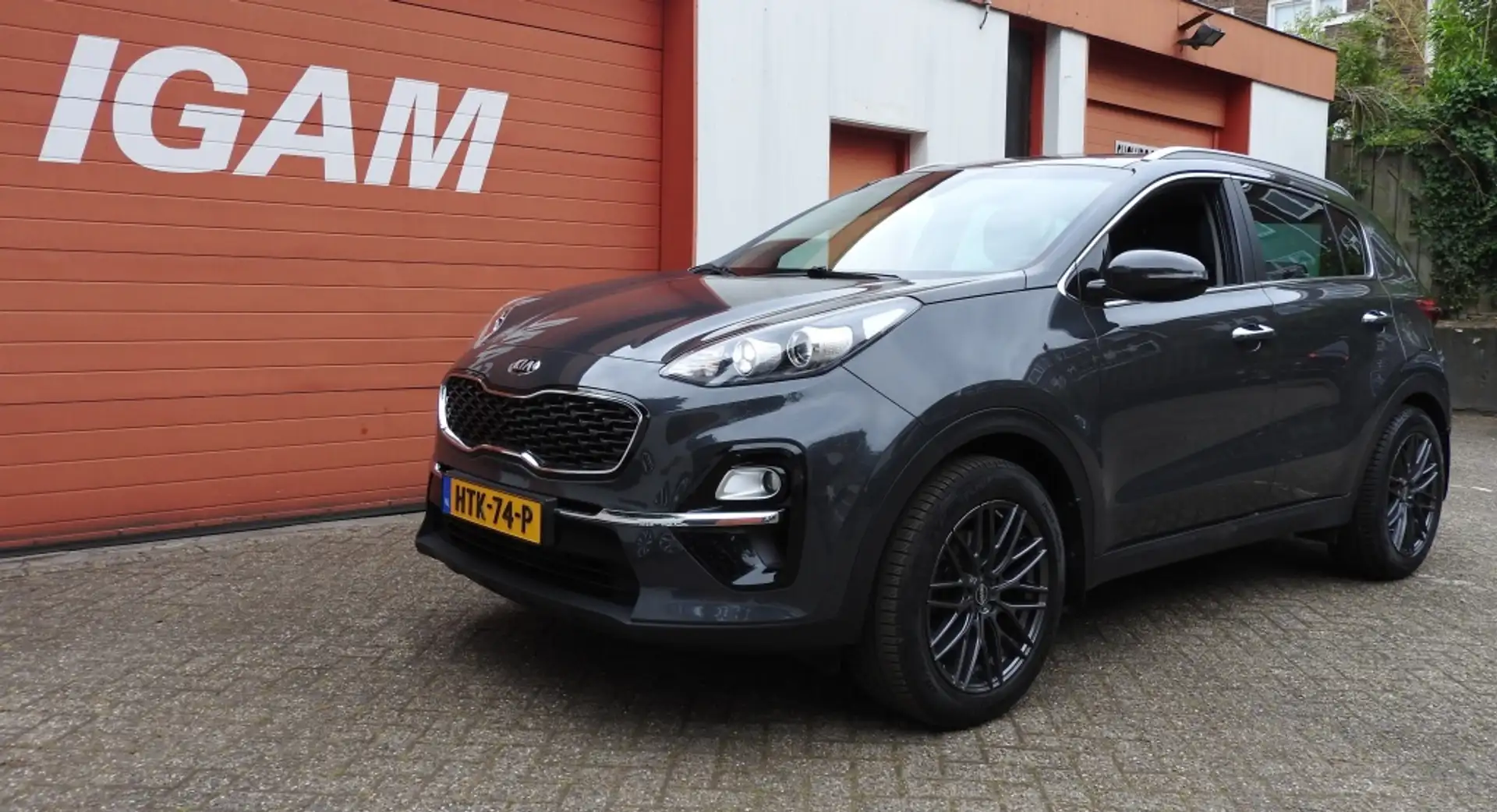 Kia Sportage 1.6 T-GDI Dyn.Pl.L., CC, trekhaak, 18 en 19 inch s Grijs - 1