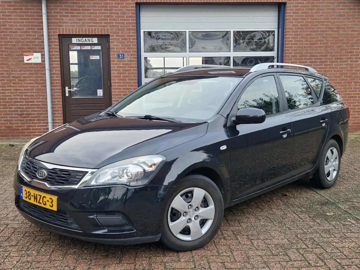 Kia Ceed / cee'd Wagon 1.4 CVVT X-tra NL-auto Airco Zwart - 1