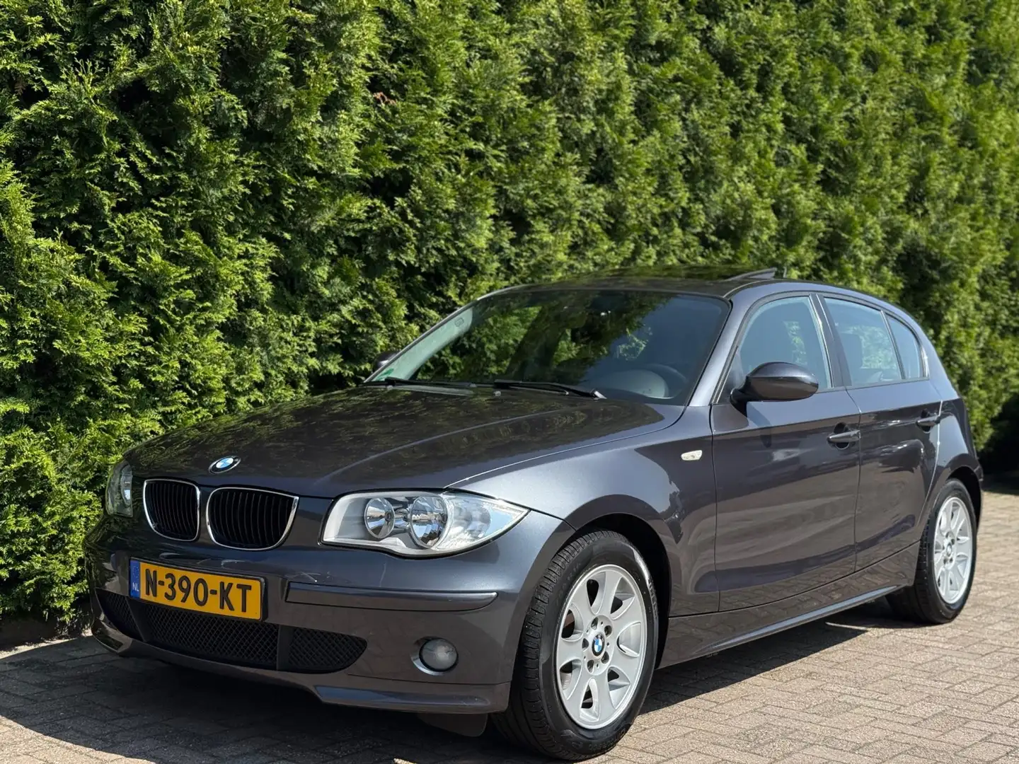 BMW 116 1-serie 116i High Executive Airco Schuifdak Grijs - 1