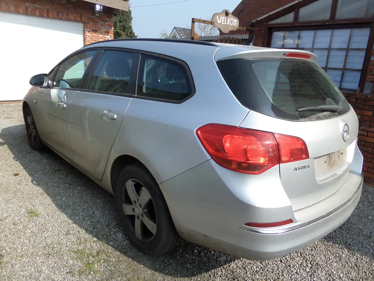 Opel Astra Astra 1.7 CDTI DPF Sports Tourer Exklusiv Grijs - 1